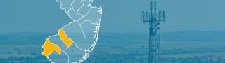 State of New Jersey with counties outlined; Camden and Salem counties highlighted, a cell tower
