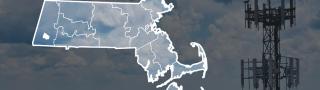 Map of Massachusetts counties with Monterey highlighted over image of broadband tower and clouds.