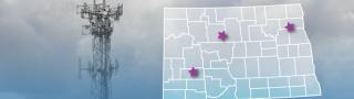 The state of North Dakota, with outlined county borders; a cell tower