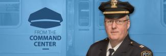 Command Center logo; Captain John Vallarelli headshot; a New York subway train stopped on the platform with open doors