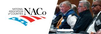 National Association of Counties logo; Public Safety Advisory Committee members seated at a table
