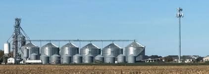 Farm buildings and a FirstNet cell tower in a rural area of North Dakota